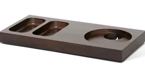 Introducing the Xanthic small mahogany welcome tray. A compact and functional addition to any hotel room. With an integrated space for the kettle base, 2 indentations for sachets and spoons, your guests can easily make their own tea or coffee. Crafted from durable beech wood and coated with a strong lacquer, this tray is designed to minimise scratches and stains. The rounded corners make cleaning a breeze. The Xanthic tray is not only practical but stylish too, with its elegant mahogany finish. With an anti-theft cable that can be fixed to the base, you are assured that your tray and its contents are safe and secure. We think of everything.